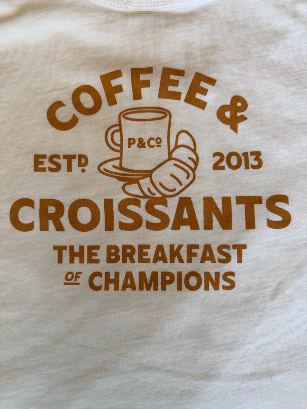 P&C White Short Sleeve Tee with Coffee & Croissant Chest Graphic